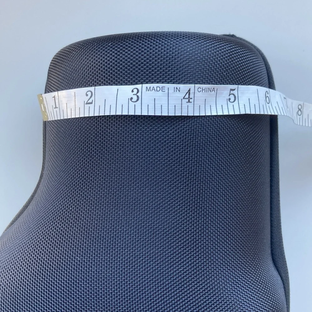 Hard carrying case for long-lens camera with strap